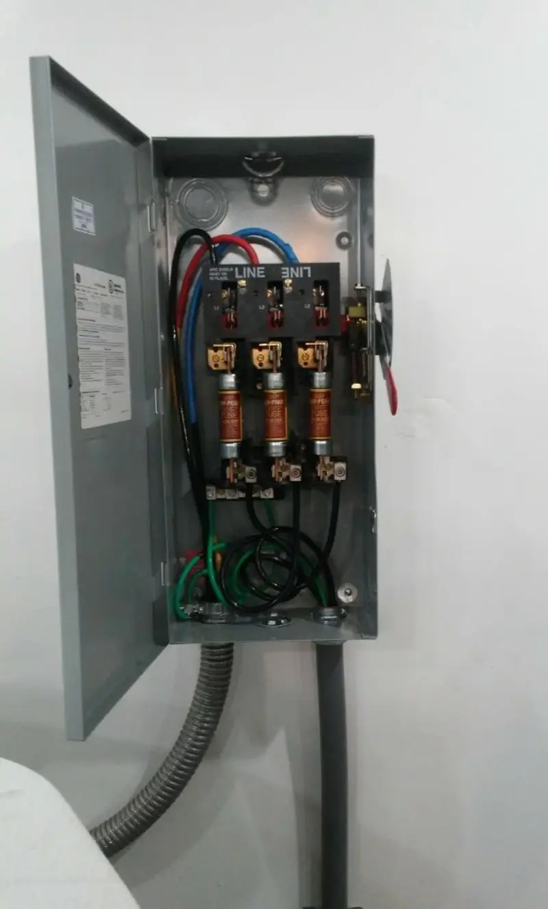 Three-phase disconnect switch installed for Smoke Detector Installation in Cedar Rapids